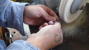 Rob working in the Lapidary shop with Red Jasper at Wicked Stones